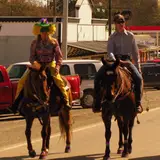 Cowboys and cowgirls celebrating at a Bandera festival
