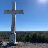 Cross Mountain rising above the town of Fredericksburg, Texas