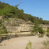 A limestone bluff along the Guadalupe River in Guadalupe River State Park, Texas