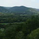 Rolling green hills and open landscape of the Texas Hill Country near Fredericksburg