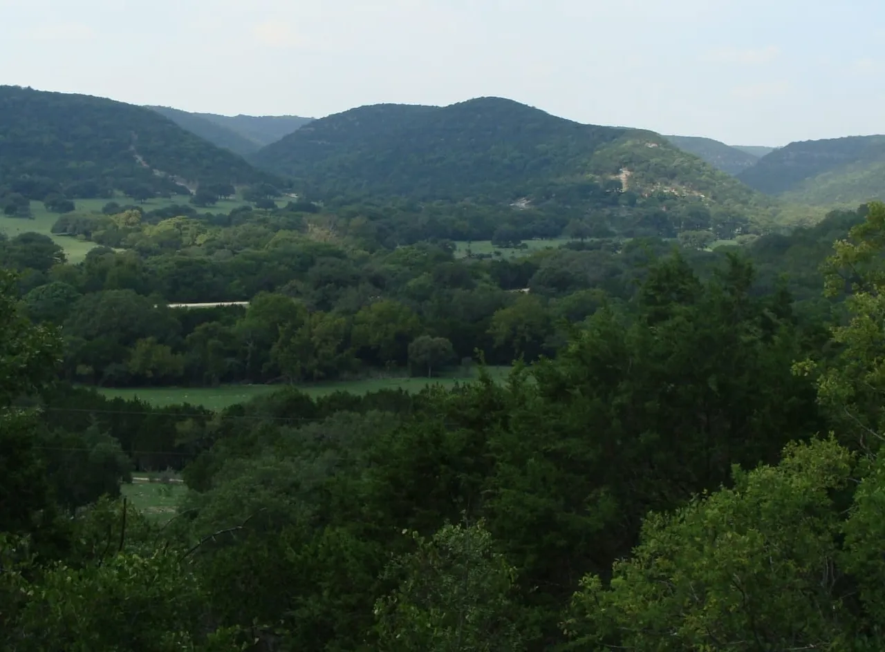 Rolling green hills and open landscape of the Texas Hill Country near Fredericksburg