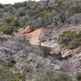 Hill Country lake overlook with rocky shoreline and blue water