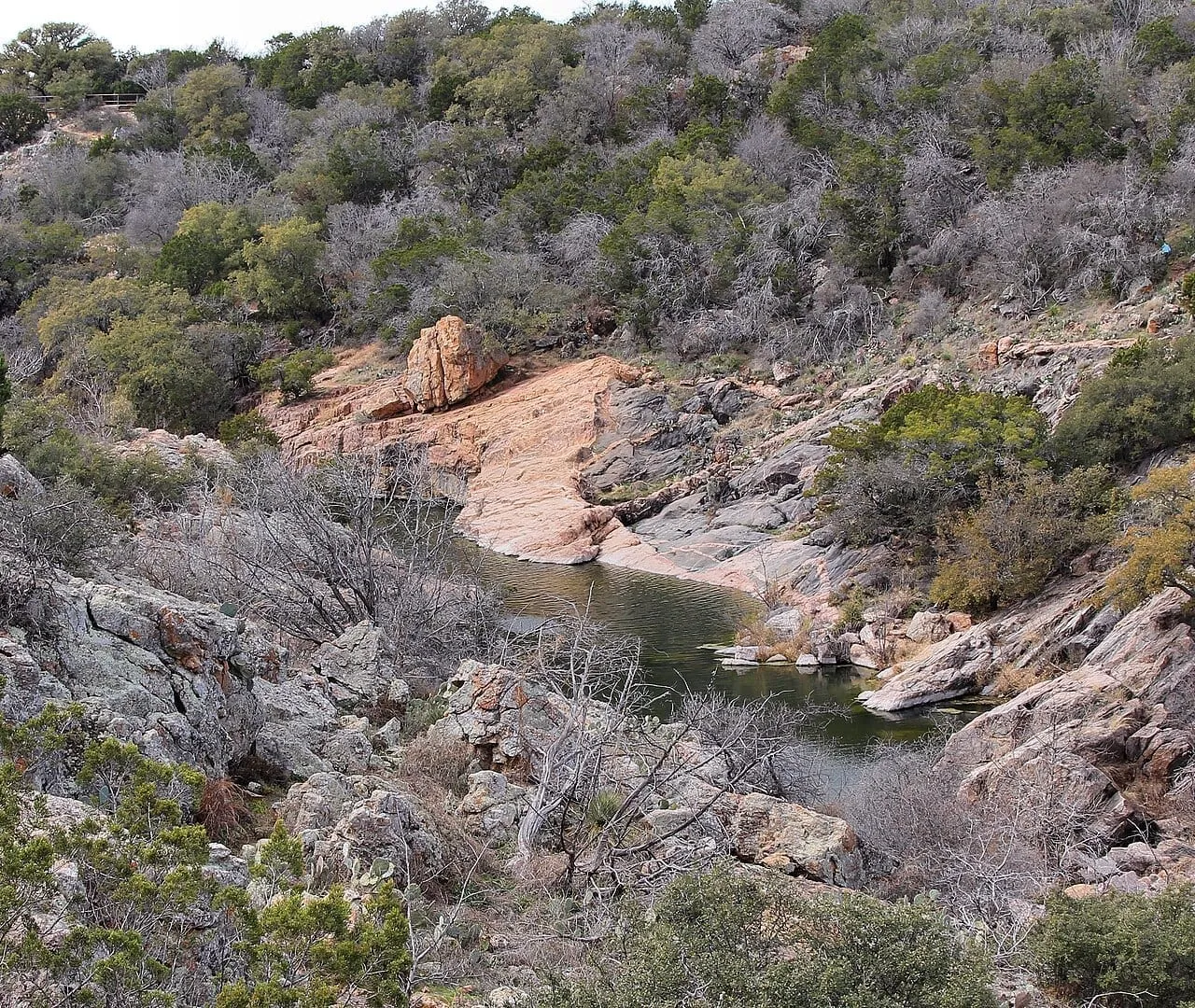 Hill Country lake overlook with rocky shoreline and blue water