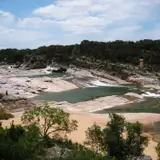 Pedernales Falls cascading over tilted limestone layers at Pedernales Falls State Park, Texas